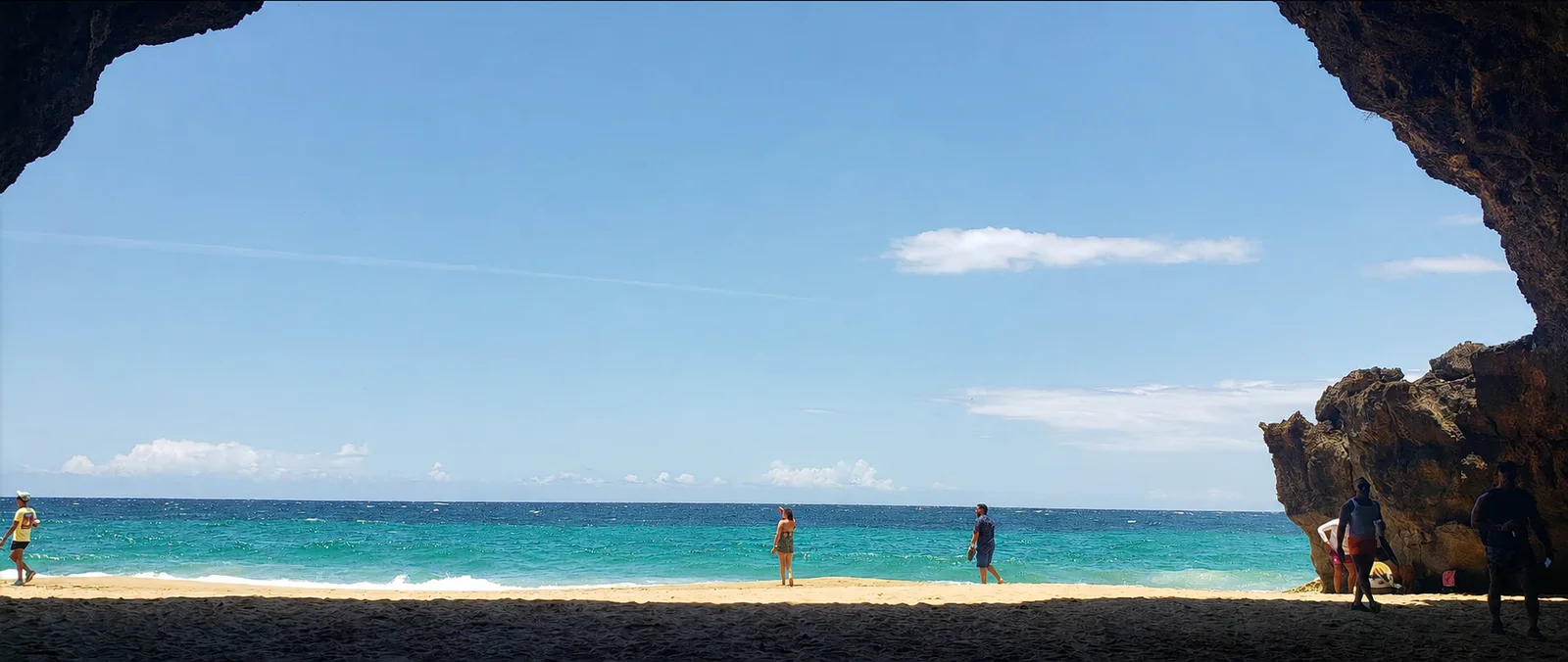 A beach in Isabela, Puerto Rico viewed from a coastal cave